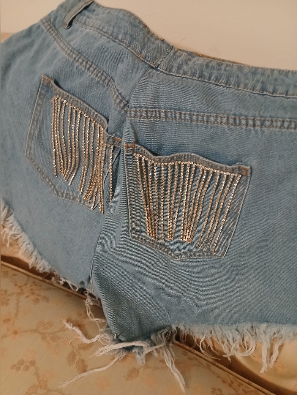 Light Wash Denim Cutoff Shorts with Rhinestone Fringe